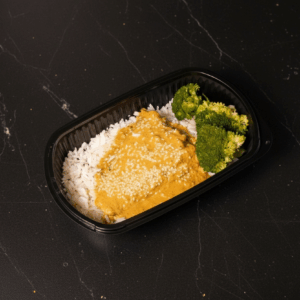 Katsu haddock served with basmati rice & broccoli florets.