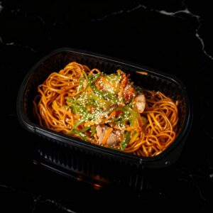 Firecracker chicken stir fry served with Chinese egg noodles.